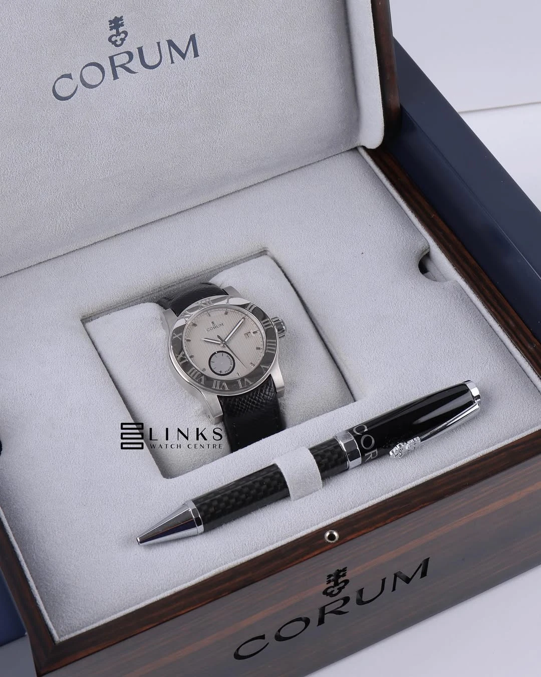CORUM steel with pen